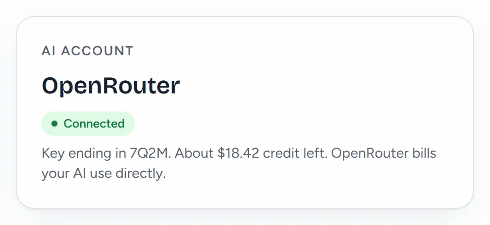 The AI account card: OpenRouter, Connected, key ending in 7Q2M, and "OpenRouter bills your AI use directly."
